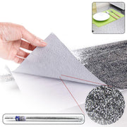Roll of self-adhesive aluminium kitchen foil for surface protection.