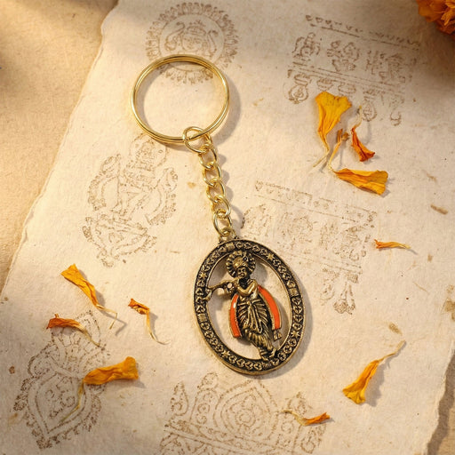 Lord Krishna metal keychain with antique oval frame design