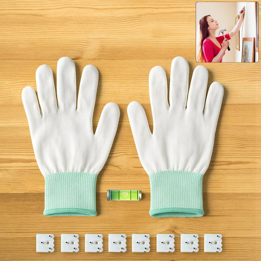 Multi-purpose picture hanging kit laid out with gloves, hooks, and mini level
