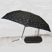 Compact umbrella with UV shield and zip case, displayed open for sun and rain protection.