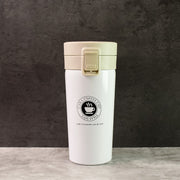 Close-up of  stainless steel vacuum insulated coffee flask showing specifications