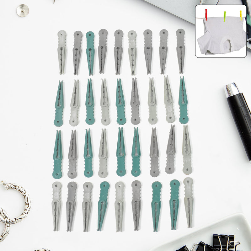 A set of 36 colourful plastic cloth pegs in a clear plastic basket, ready for laundry.