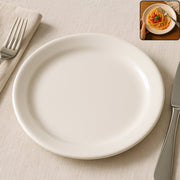 30 cm round dinner plate with glossy white finish on table