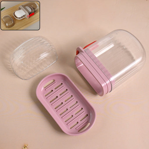 Plastic soap dish with transparent dust-proof lid and pink base showing multipurpose design