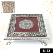 Elegant silver square pooja bajot featuring a detailed mandala engraving for sacred rituals.