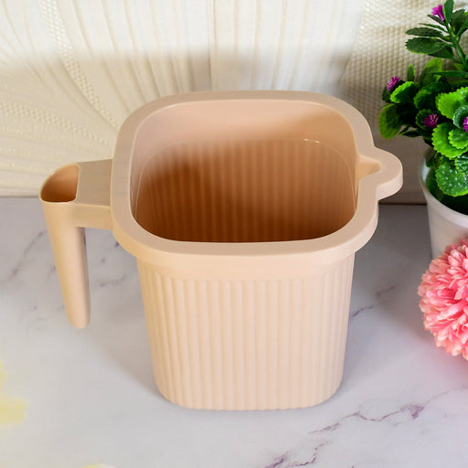Assorted clear and colored Plastic Bath Mugs, showing multi-use design.