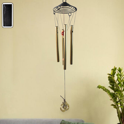 Dragonfly outdoor wind chime with vibrant colours in garden setting