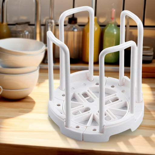 White ABS plastic kitchen bowl rack, front view, holding multiple bowls.