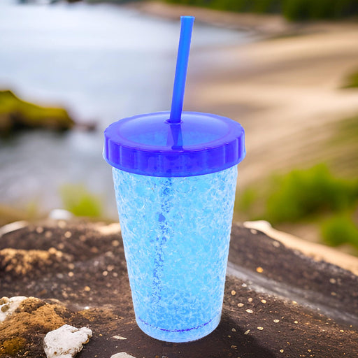 Vibrant plastic reusable sipper tumbler with straw and lid.
