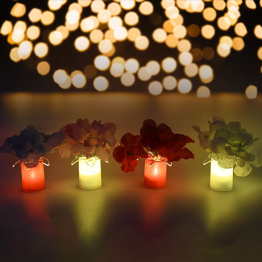 Set of four LED mood lights illuminating a bedroom at night, creating a cozy ambiance.