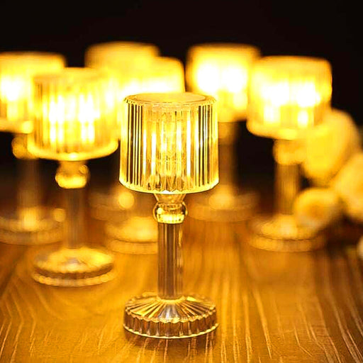 Mini Acrylic LED Desk Lamp glowing softly, ideal for festive decor.