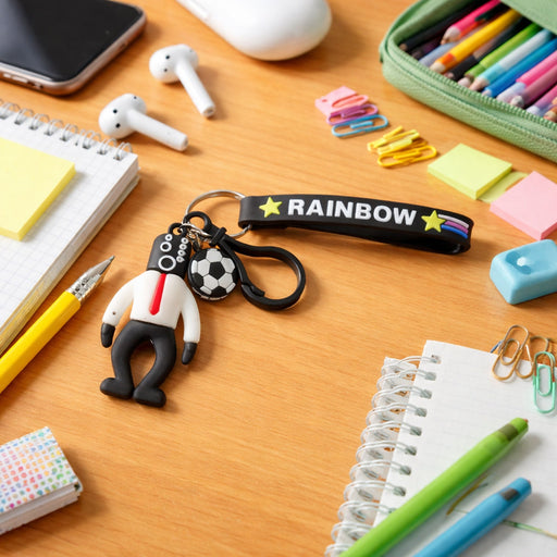 Colorful cartoon football boy keychain with rainbow strap, perfect for backpacks and keys