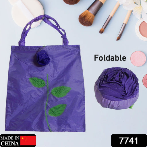 Two views of the eco-friendly foldable shopping bag, one folded into a rose and one fully open.