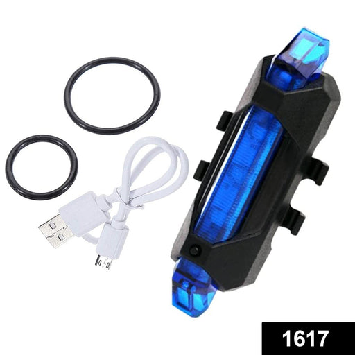 Front view of a blue waterproof LED bicycle light, highlighting its compact size and bright output.