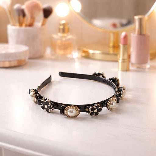 Elegant pearl and floral hairband with pearl studs and flower detailing
