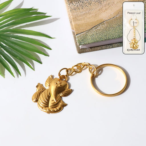 Golden Ganesh leaf design metal keychain front view
