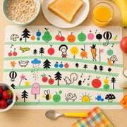 Colorful kids placemat with cartoon characters on dining table