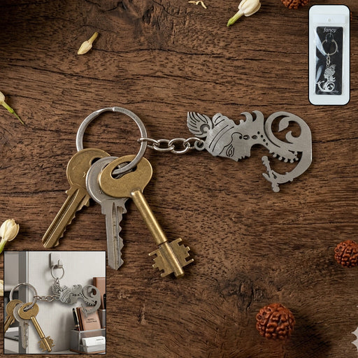 Metal Krishna face keychain with detailed Lord Krishna design