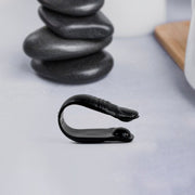 LI4 Acupressure Point Clip clipped on hand, close-up view