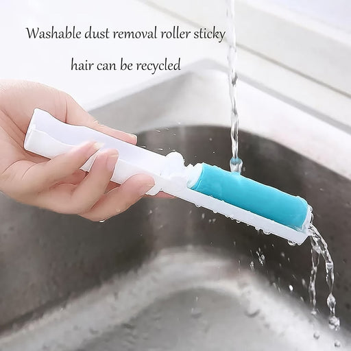 A hand demonstrates the reusable lint roller effectively cleaning fabric.