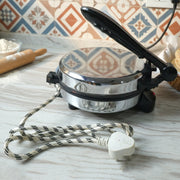 Alternative angle showing compact design of electric roti maker