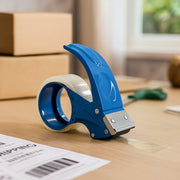 Close-up of heavy-duty tape cutter showing serrated steel blade