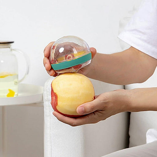 Quickslice multifunctional round peeler with peel-catching container.