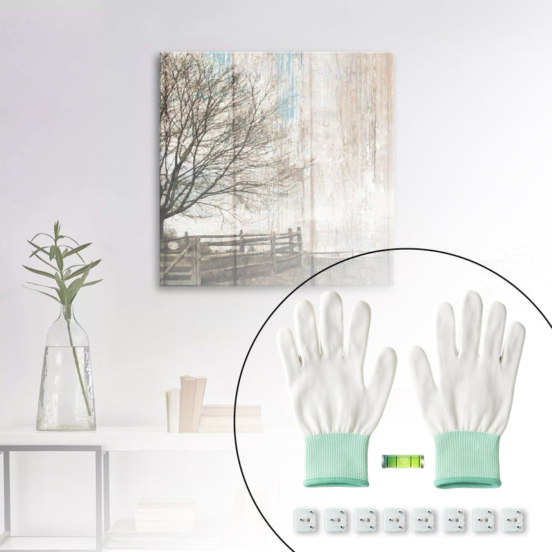 Contents of the picture hanging kit arranged on flat surface