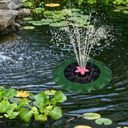 Decorative solar-powered floating water fountain pump placed on water surface