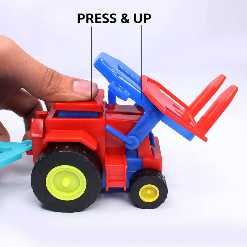Friction tractor toy with its red trolley loaded with colorful toy bricks, on a plain surface.