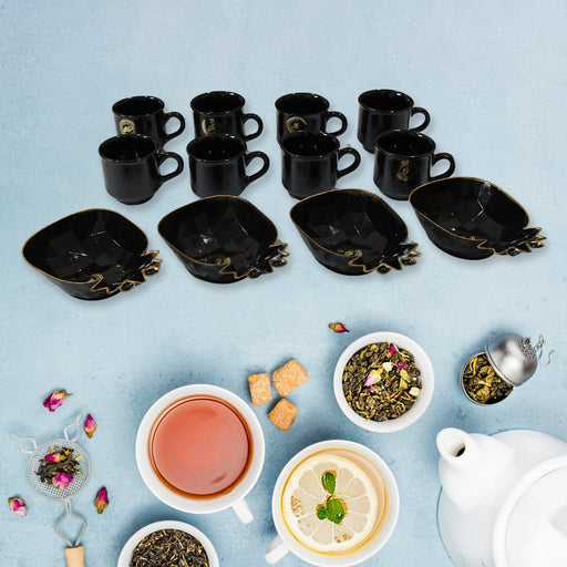 Elegant ceramic tea cups and pineapple-shaped plastic serving bowls.