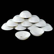 Elegant 32-piece plastic dinner set with plates, bowls, and cutlery.