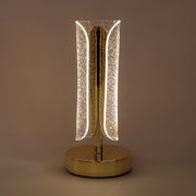 Elegant golden LED crystal table lamp for bedroom bedside use