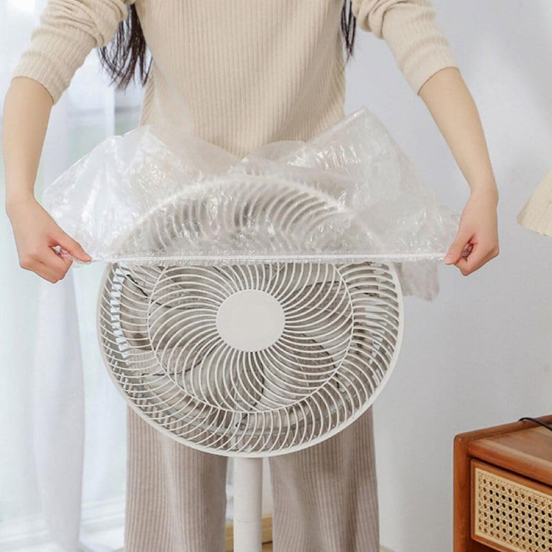 Individual plastic covers protecting dining chairs from dust.