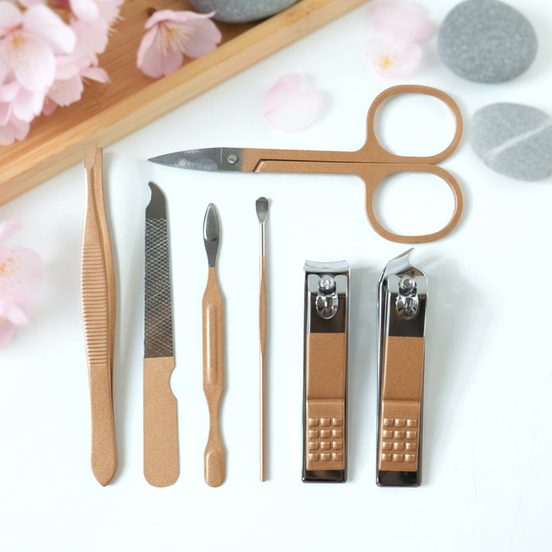 Manicure kit tools arranged for personal nail and eyebrow grooming