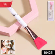 Close-up of silicone head on face mask applicator brush