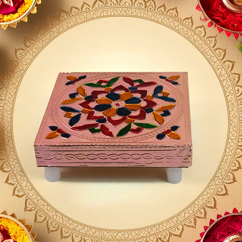 Top-down view of the Meenakari Puja Chowki, highlighting its vibrant design.