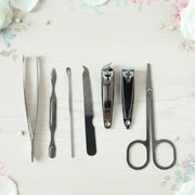 Portable manicure and pedicure tool set in a compact case for travel