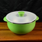 Ergonomic serving bowl with side handles and vented plastic lid