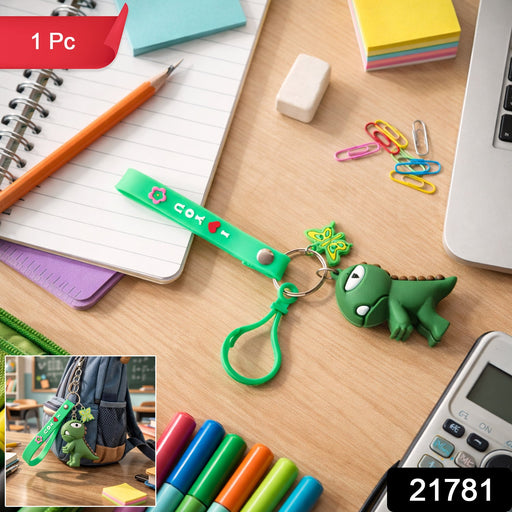 Dinosaur keychain attached as a colorful bag charm