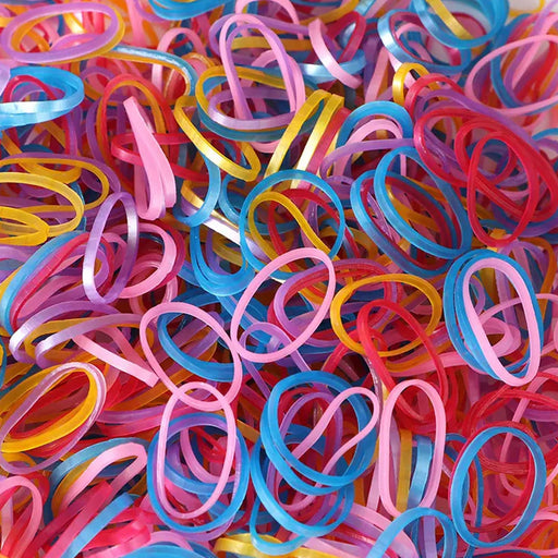 Multicolor elastic rubber bands neatly organized for office and home use.