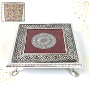 Silver Pooja Chowki with intricate Lakshmi design, perfect for Diwali celebrations.