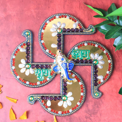 Golden Swastik Shubh Labh Wall Hanging featuring central Ganesh idol