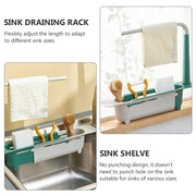 Adjustable kitchen sink organizer holding various utensils and a sponge, ready for efficient drying.