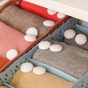 Fresh tabs of naphthalene mothballs keeping wardrobes free from pests and odour