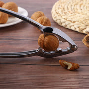 Top-down view of the durable stainless steel walnut cracker.