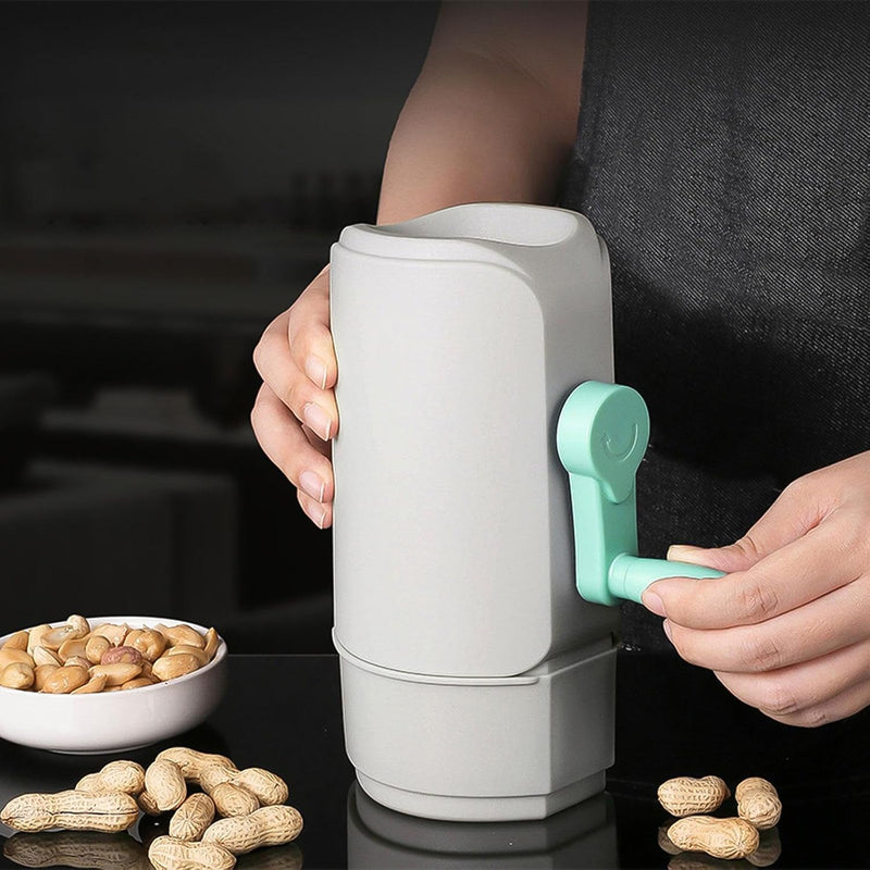Side view of the manual peanut sheller, highlighting its sturdy design.