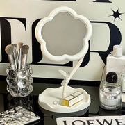 Decorative flower-shaped desktop mirror enhancing room beauty and function