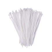 A hand holding flexible black self-locking cable ties, demonstrating their durability.