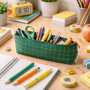 Colorful pens and pencils organized in the green grid stationery pouch.
